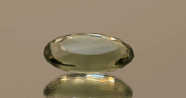 Natural prasiolite gemstone, 13.32 carat, oval cut, pale green color, untreated, loose gemstone, dimensions 21.3 × 11.9 × 7.9 mm, ideal for fine jewelry.