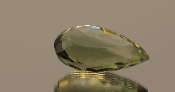 Natural prasiolite gemstone, 20.51 carat, pear cut, pale green color, untreated, loose gemstone, dimensions 24 × 14.9 × 9.9 mm, ideal for fine jewelry.