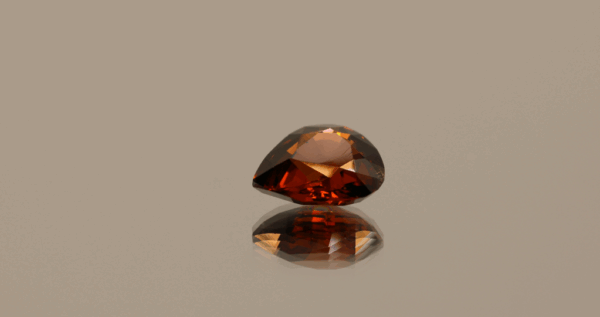 Natural spessartite garnet, 2.8 carats, pear cut, orange-red color, untreated