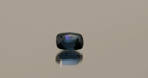 Blue spinel, cushion-shaped, 1.62 carat, 7.66 × 5.68 × 4.40 mm, no treatment, unknown origin, AIGS certified.