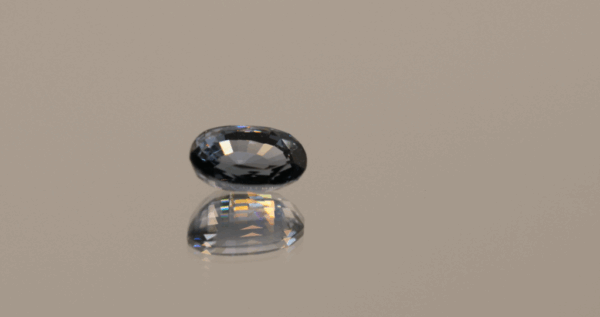 Blue oval-shaped GIA spinel, 1.57 carat, 8.32 × 5.28 × 4.14 mm, no treatment, unknown origin, GIA certified.