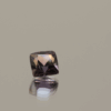 Natural sapphire gemstone, 0.79 carat, cushion cut, orange-pink color, padparadscha, unheated, loose gemstone, dimensions 4.85 × 4.73 × 3.71 mm, origin Madagascar, AIG certified.