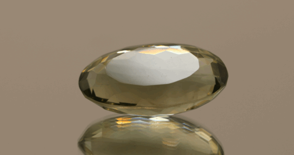 Natural prasiolite gemstone, 17.3 carat, oval cut, pale green color, untreated, loose gemstone, dimensions 22.3 × 12.5 × 9.1 mm, ideal for fine jewelry.