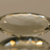 Natural prasiolite gemstone, 22.39 carat, oval cut, pale green color, untreated, loose gemstone, dimensions 26.8 × 13.5 × 9.1 mm, ideal for fine jewelry.