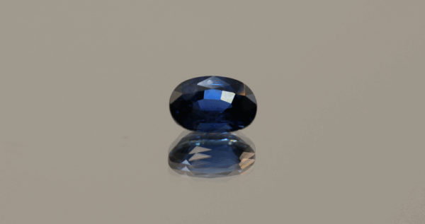 Sapphire Blue stone oval-shaped, 1.11 carat, 7.11 × 5.01 × 3.60 mm, heat-treated, unknown origin, AIG certified.