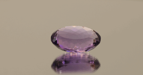 Natural oval cut amethyst gemstone with purple violet color, 17.70 × 13.00 mm