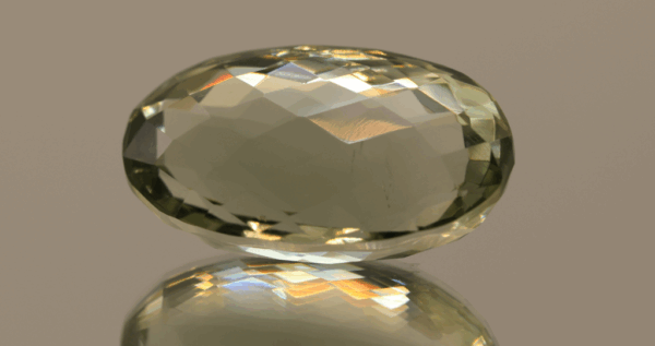 Natural prasiolite gemstone, 33.62 carat, oval cut, pale green color, untreated, loose gemstone, dimensions 26.4 × 15.8 × 12.8 mm, ideal for fine jewelry.