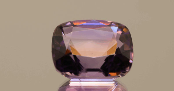 Natural cushion cut amethyst gemstone with purple violet color, 17.50 × 14.40 mm