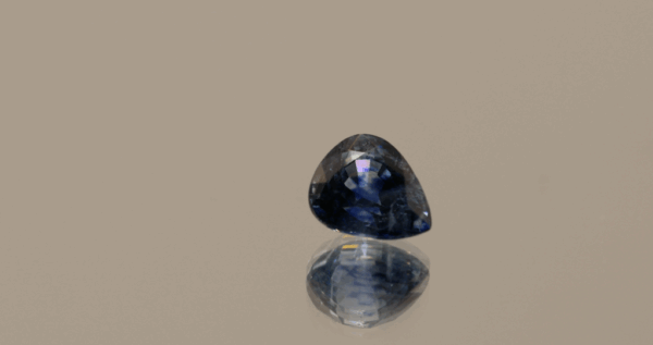Cornflower blue pear-shaped sapphire, 1.20 carat, 6.55 × 5.45 × 4.12 mm, heat-treated, unknown origin, IGS certified.