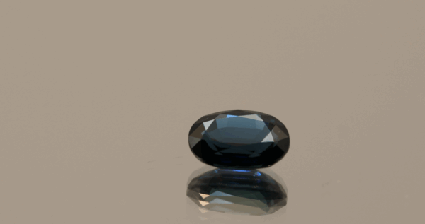 Sapphire Royal blue gemstone 1.47 carat oval cut, heat treated, Madagascar origin, dimensions 7.74 × 5.71 × 3.41 mm, GFCO certified.