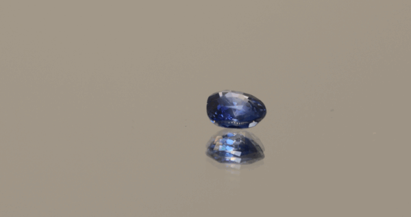 Blue pear-shaped sapphire, 0.62 carat, 5.54 × 4.91 × 2.57 mm, heat-treated, unknown origin, AIG certified.