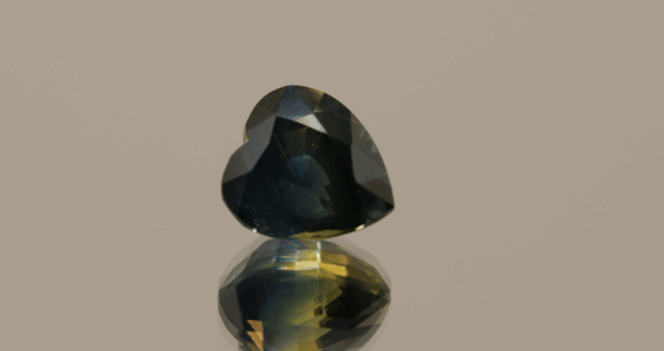 Natural Blue Sapphire Heart gemstone, 3.7 carat, heart cut, greenish-blue color, heat treated, loose gemstone, dimensions 8.47 × 7.86 × 6.92 mm, origin Madagascar, AIG certified.