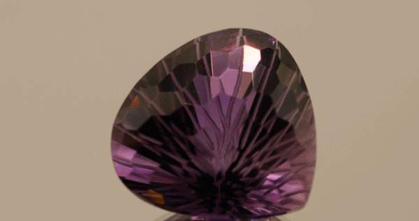Natural pear cut amethyst gemstone with purple violet color, 18.80 × 18.00 mm