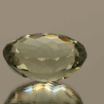 Natural prasiolite gemstone, 14.64 carat, oval cut, pale green color, untreated, loose gemstone, dimensions 18 × 13.5 × 8.9 mm, ideal for fine jewelry.