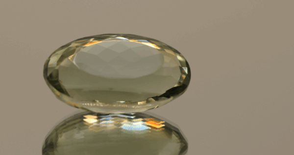 Natural prasiolite gemstone, 19.91 carat, oval cut, pale green color, untreated, loose gemstone, dimensions 22.2 × 13.7 × 10.1 mm, ideal for fine jewelry.