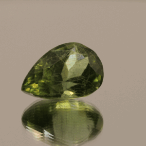 Natural 7.82 carat peridot, pear cut, yellowish green color, untreated, loose gemstone, dimensions 15.11 × 10.23 × 8.22 mm, perfect for fine jewelry.