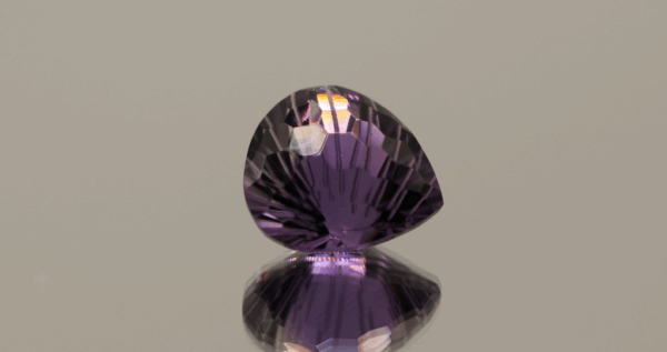 Natural pear cut amethyst gemstone with purple violet color, 13.70 × 12.70 mm