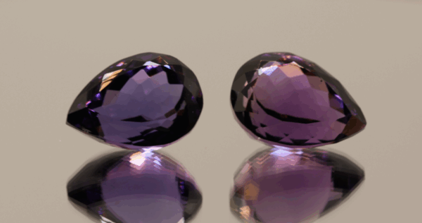 Natural pear cut amethyst gemstones with purple violet color, 16.40–17.20 × 11.20–12.10 mm