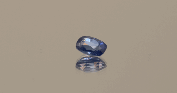 Natural sapphire gemstone, 0.92 carat, cushion cut, cornflower blue color, heat treated, loose gemstone, dimensions 6.06 × 4.55 × 3.24 mm, origin Sri Lanka, AIG certified.
