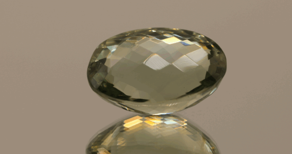 Natural prasiolite gemstone, 21 carat, oval cut, pale green color, untreated, loose gemstone, dimensions 21 × 14.6 × 11.7 mm, ideal for fine jewelry.