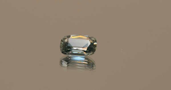 Natural Color Change Sapphire Cushion gemstone, 1.44 carat, cushion cut, light green-blue to pink color, color change, unheated, loose gemstone, dimensions 8.02 × 5.98 × 3.2 mm, origin Madagascar, GFCO certified.
