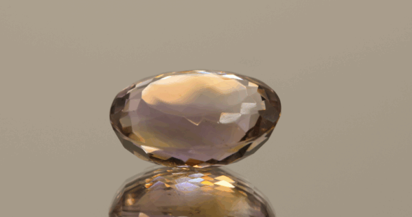 Natural oval cut ametrine gemstone with purple yellow color, 17.70 × 13.30 mm