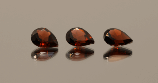 Natural spessartite garnets, 5.23 carats each, pear cut, orange-red color, untreated, set of 3