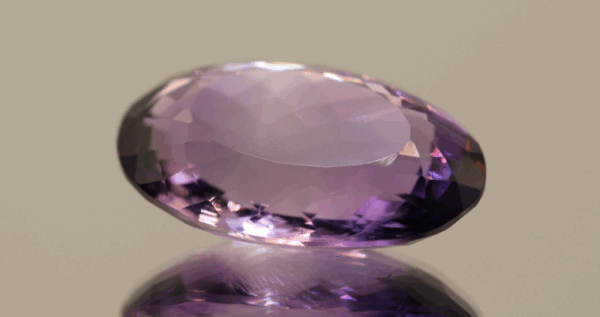 Natural oval cut amethyst gemstone with purple violet color, 23.90 × 16.30 mm