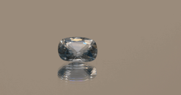 Unheated blue sapphire gemstone, 1.65 carat, cushion cut, blue color, unheated, loose gemstone, dimensions 8.09 × 6.15 × 3.75 mm, origin Madagascar, AIG certified.