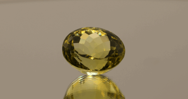 Lemon Quartz gemstone 13.86 carats, natural light yellow oval-cut, premium quality for jewelry