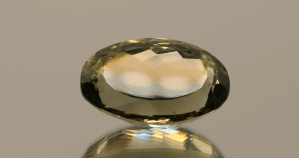 Natural prasiolite gemstone, 19.37 carat, oval cut, pale green color, untreated, loose gemstone, dimensions 21.4 × 14 × 10.1 mm, ideal for fine jewelry.