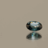 Natural sapphire gemstone, 0.8 carat, oval cut, blue color, heat-treated, loose gemstone, dimensions 6.08 × 5.02 × 3.04 mm, origin Madagascar, AIG certified.