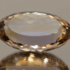 Natural oval cut ametrine gemstone with purple yellow color, 25.30 × 17.00 mm