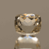 Light yellow square cushion-shaped spodumene, 12.35 carat, 13 × 10.6 × 10.1 mm, no treatment, unknown origin.